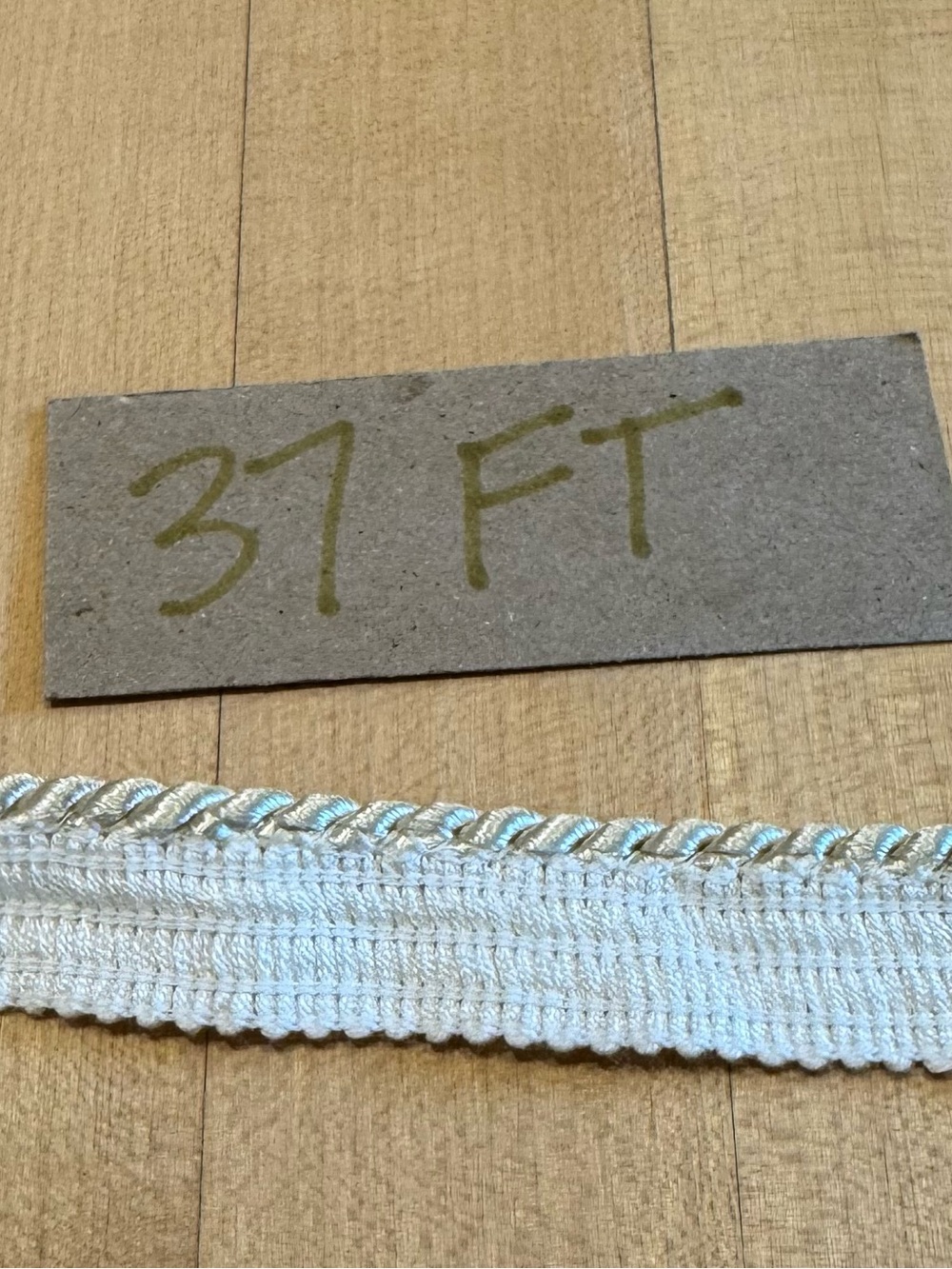 Passementerie small cord rope trim in ivory